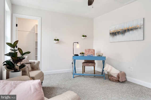 interior space featuring ceiling fan