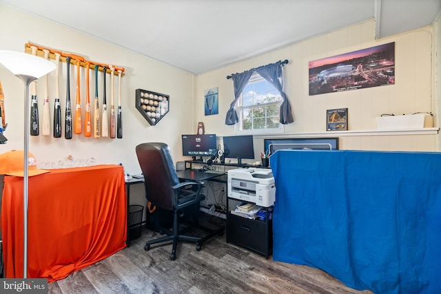 home office with wood-type flooring