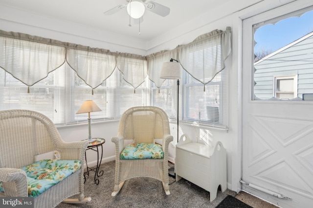 sunroom with ceiling fan