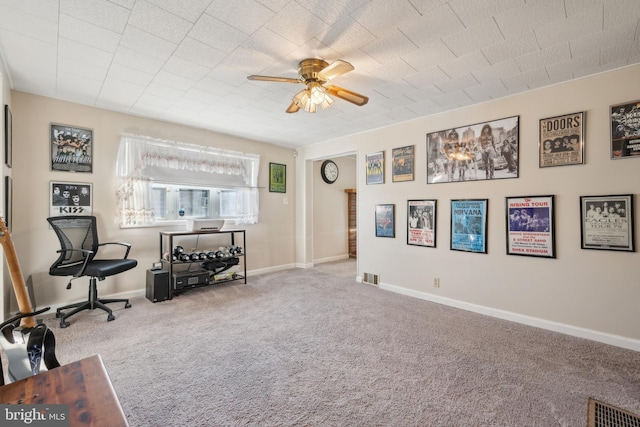 sitting room featuring ceiling fan and light carpet