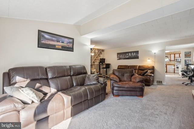 living room with carpet flooring and lofted ceiling