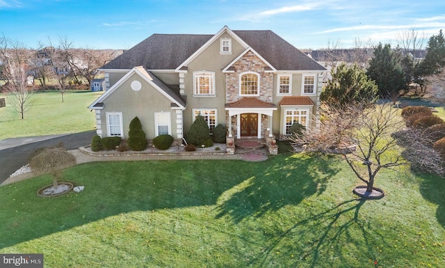 view of front of property with a front lawn and a porch