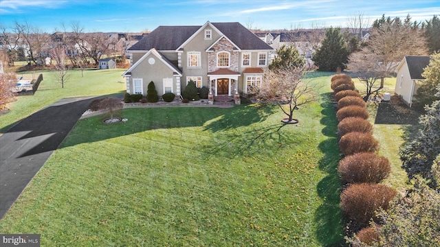 view of front facade with a front lawn