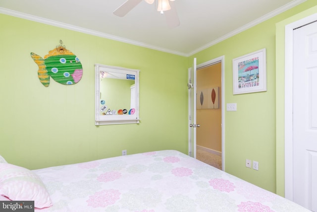 bedroom with ceiling fan and crown molding