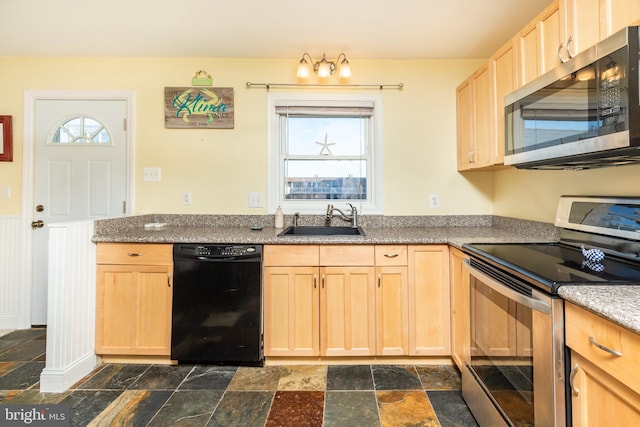 kitchen with sink, light brown cabinetry, and appliances with stainless steel finishes