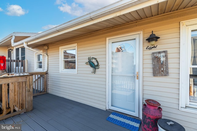 entrance to property featuring a deck