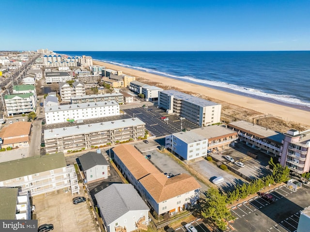 aerial view featuring a beach view and a water view