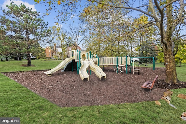 view of jungle gym with a yard