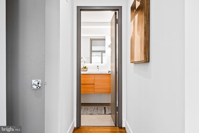 hallway featuring light hardwood / wood-style flooring