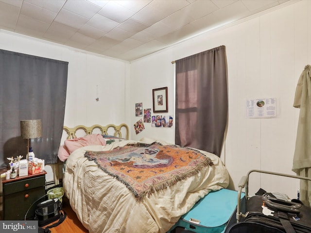 bedroom with crown molding