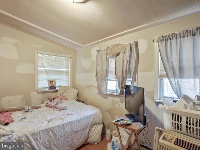 bedroom featuring lofted ceiling