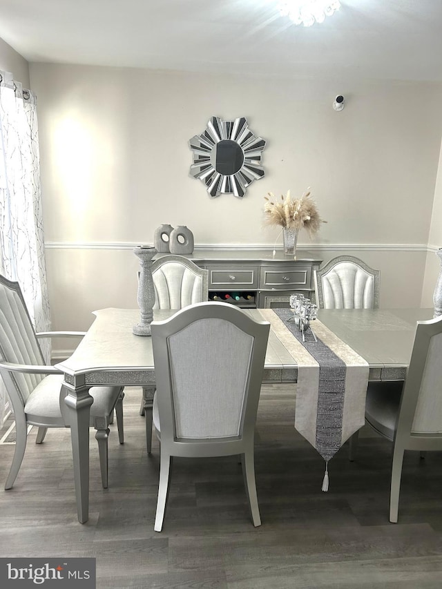 dining room featuring wood-type flooring