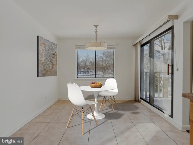 view of tiled dining space