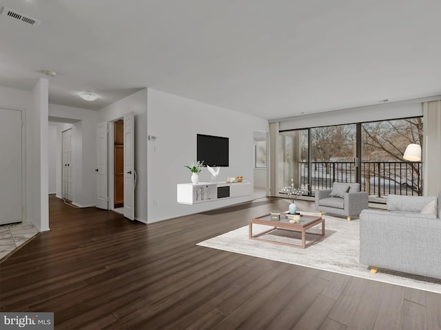 living room with dark wood-type flooring