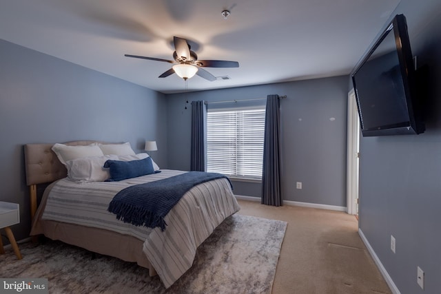 bedroom featuring ceiling fan and carpet flooring