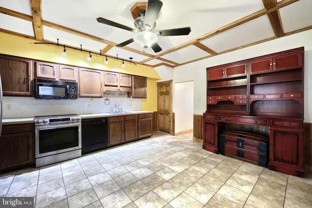 kitchen featuring ceiling fan, sink, light tile patterned floors, and black appliances