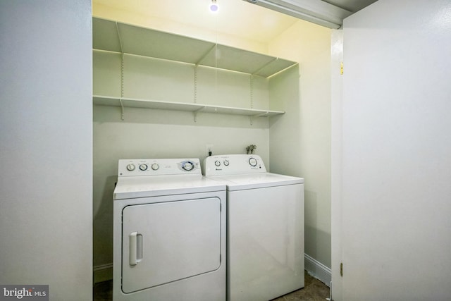 laundry room with washing machine and dryer