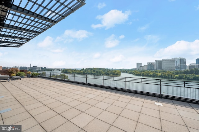 view of patio / terrace with a water view