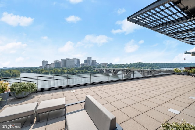 view of patio / terrace with a water view