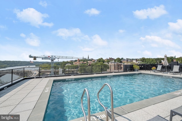 view of pool with a patio