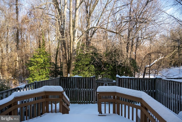 view of snow covered deck