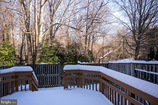 view of snow covered deck