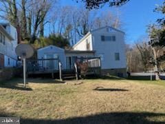 view of yard featuring a wooden deck