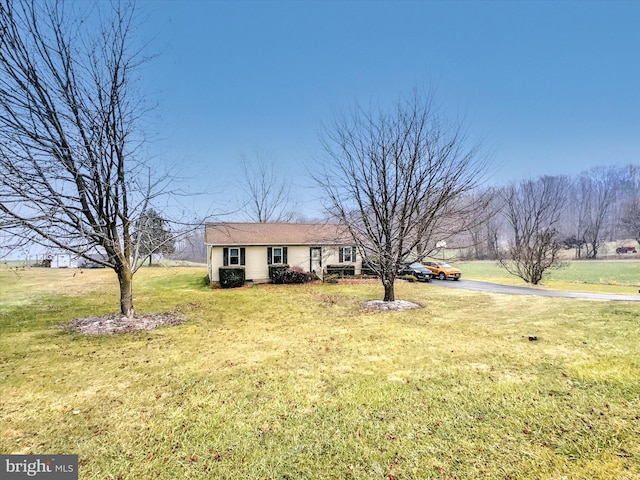 view of front of house with a front lawn