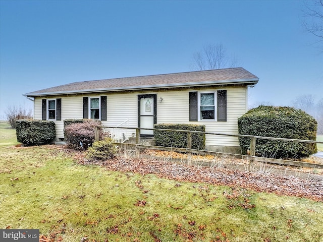 single story home with a front lawn