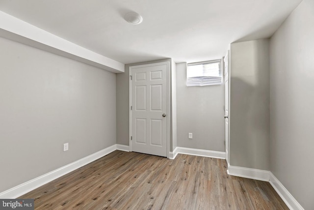 basement featuring light hardwood / wood-style floors