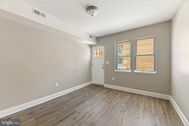 unfurnished room featuring light wood-type flooring