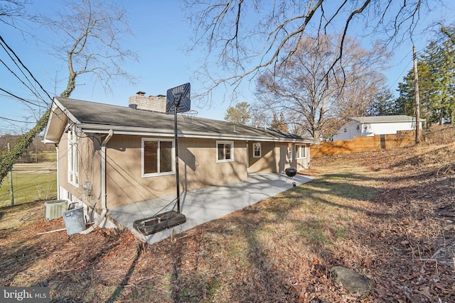 back of property featuring a patio area