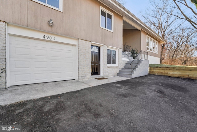 exterior space with a garage