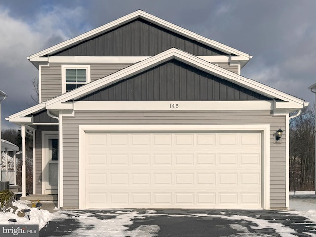 view of front of home with a garage