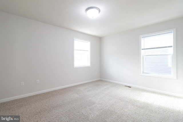 view of carpeted spare room