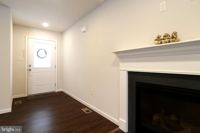 foyer featuring dark hardwood / wood-style floors