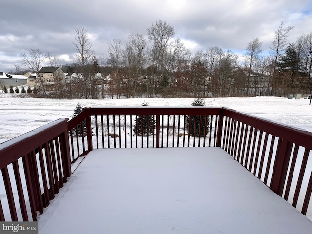 view of snow covered deck