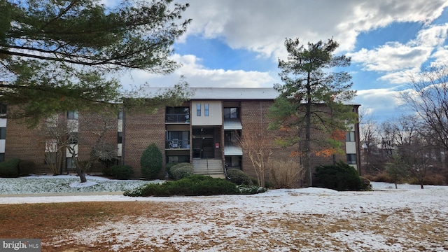 view of snow covered building