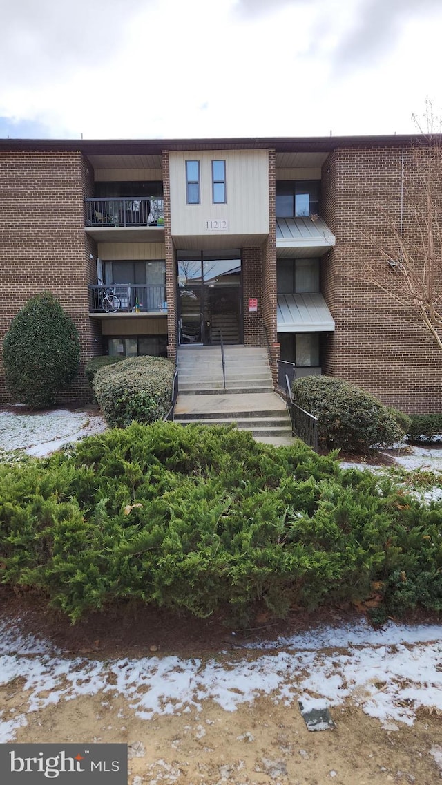 view of snow covered building