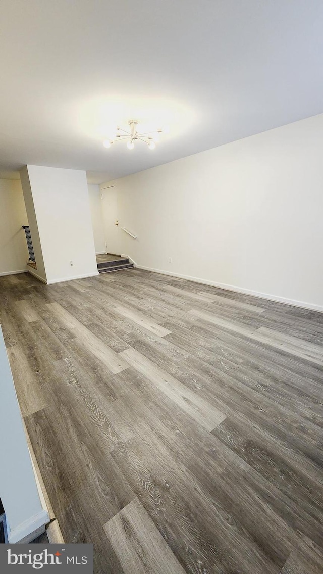 spare room featuring hardwood / wood-style floors