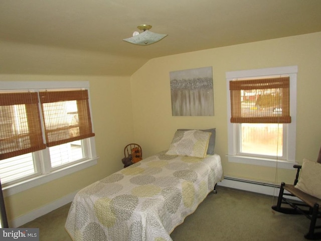 carpeted bedroom with lofted ceiling