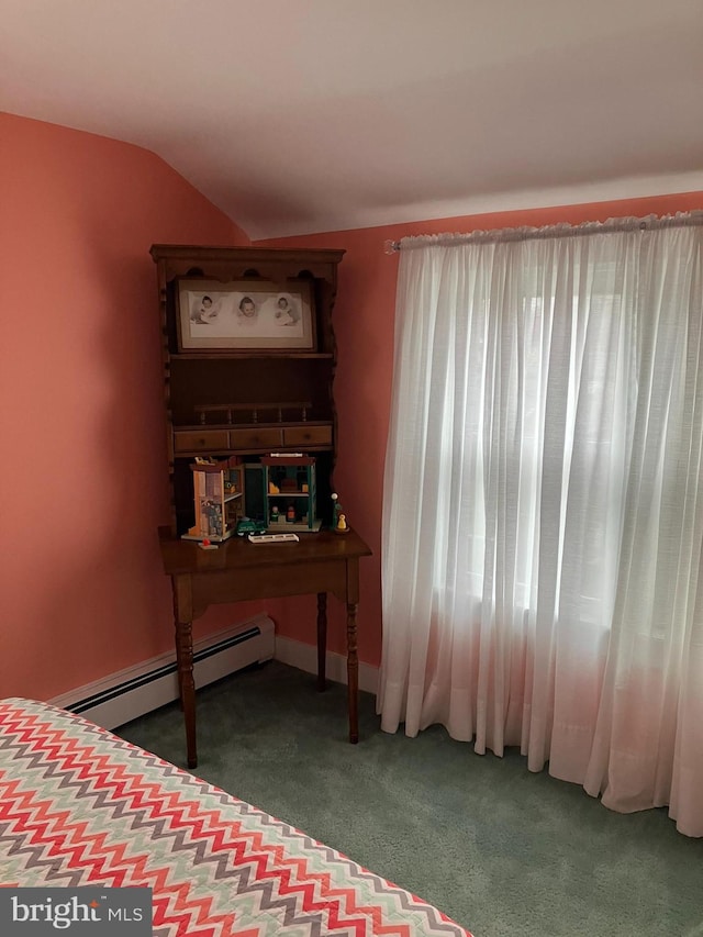 carpeted bedroom with a baseboard heating unit and lofted ceiling