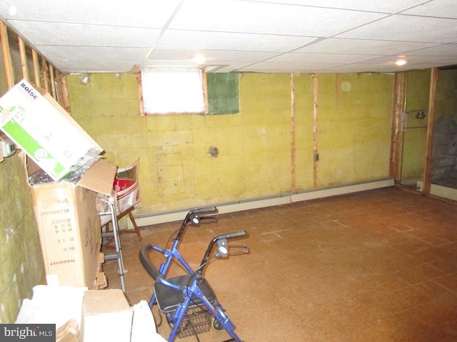 basement featuring a baseboard radiator