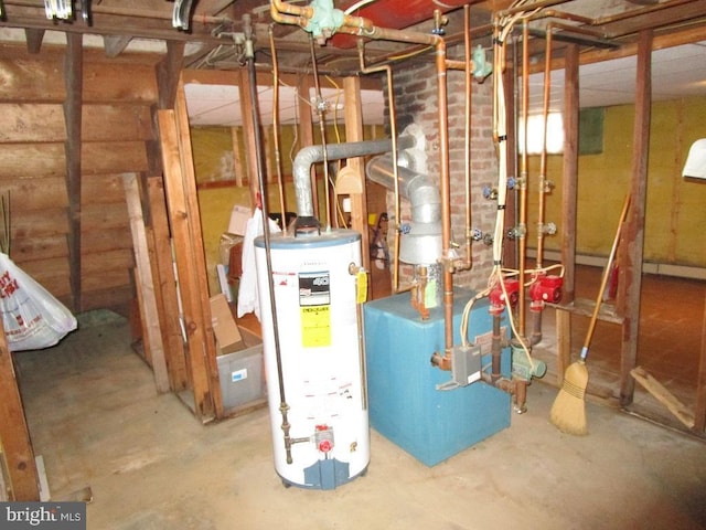 utility room featuring water heater