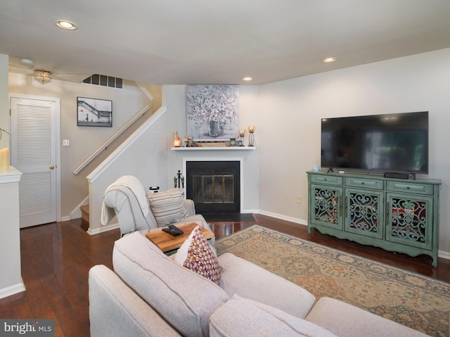 living room with dark wood-type flooring