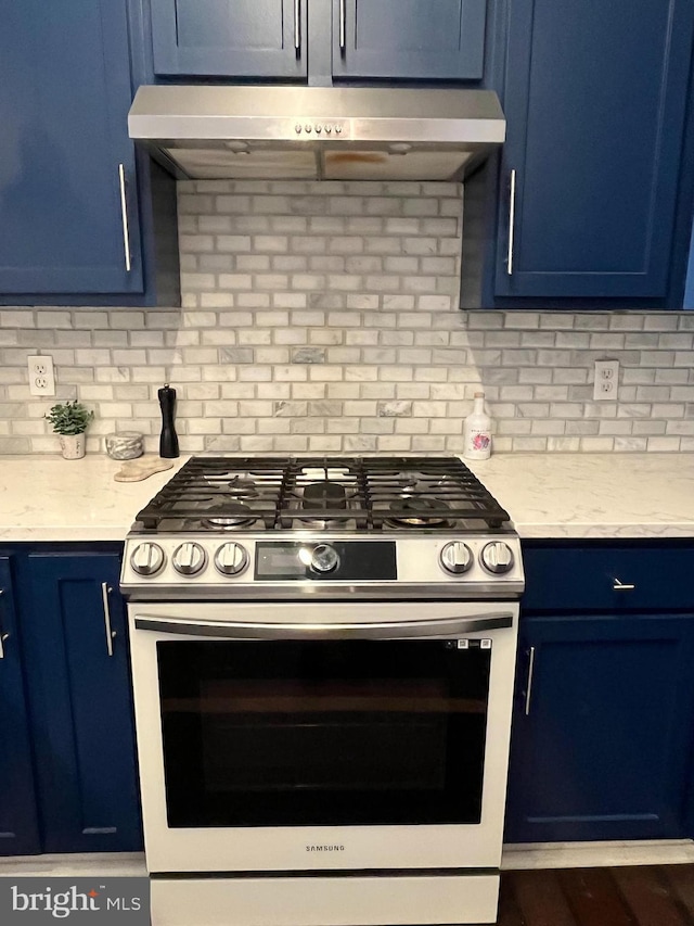 kitchen featuring blue cabinets and stainless steel range with gas stovetop