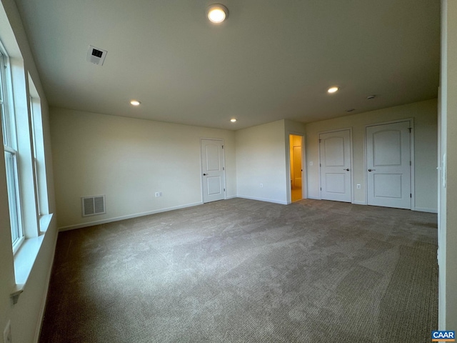 unfurnished bedroom with carpet flooring