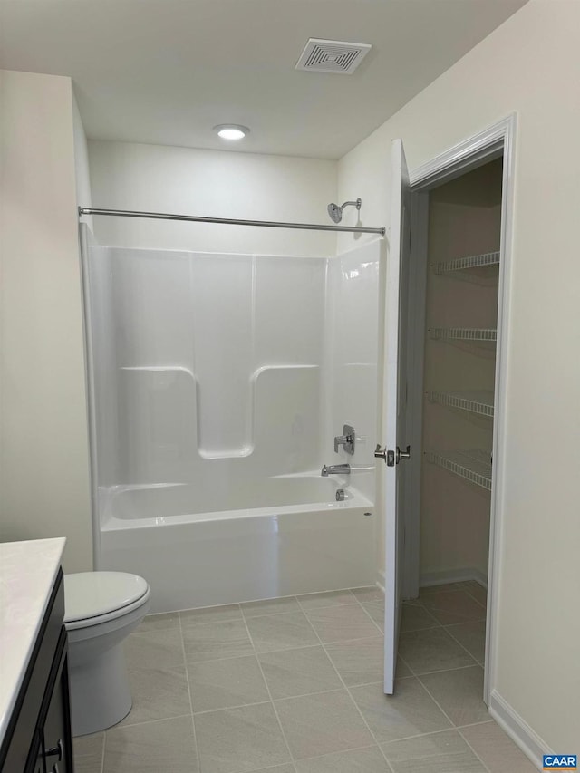 full bathroom with tile patterned floors, vanity, toilet, and shower / washtub combination