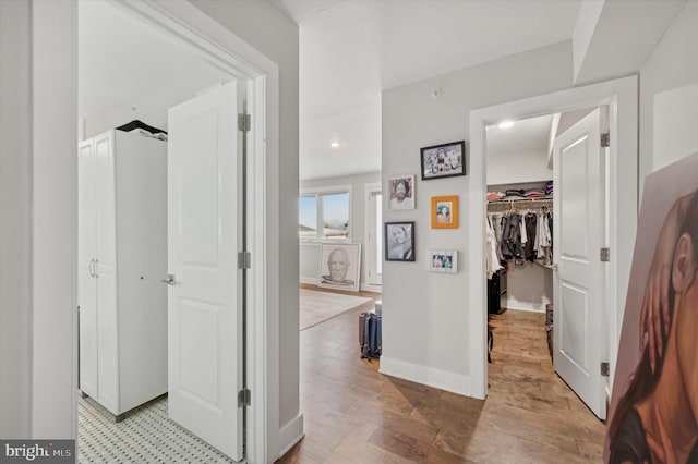 hallway featuring light hardwood / wood-style flooring