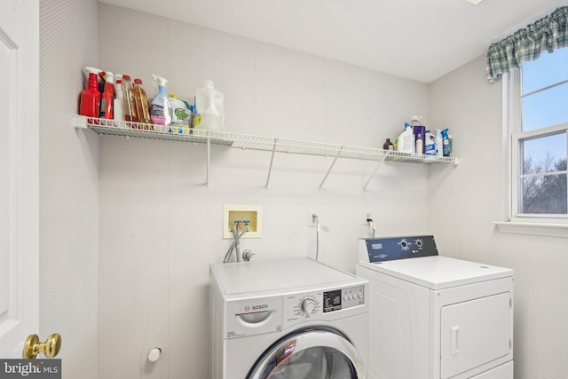 laundry room featuring washer and dryer